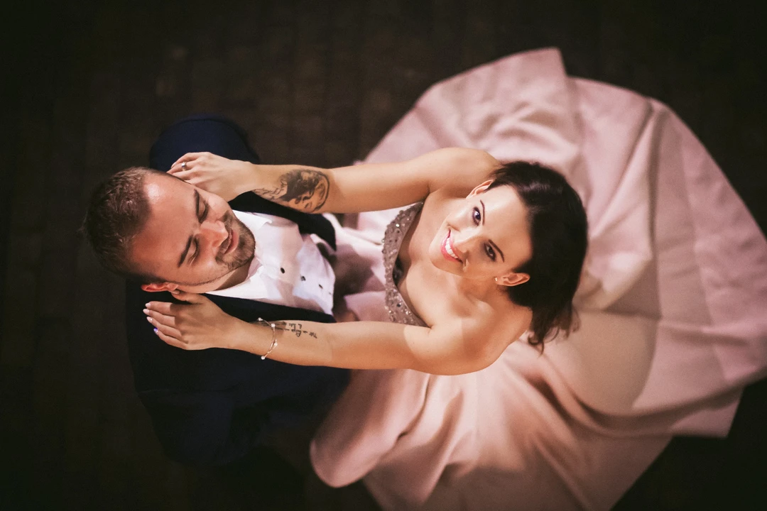 a man and woman sitting on a couch